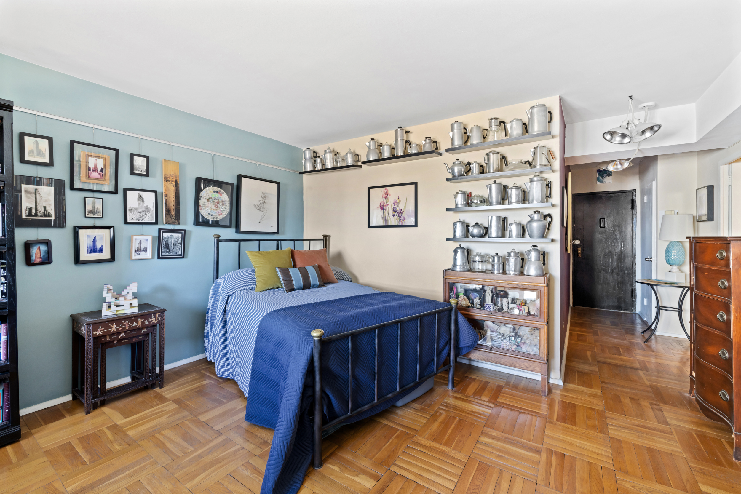 105 Ashland Place, Unit 16E Brooklyn, NY 11201 - Photo 3 of 7 a bedroom with a bed and a cabinets