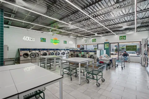 a view of a chairs and table in a room