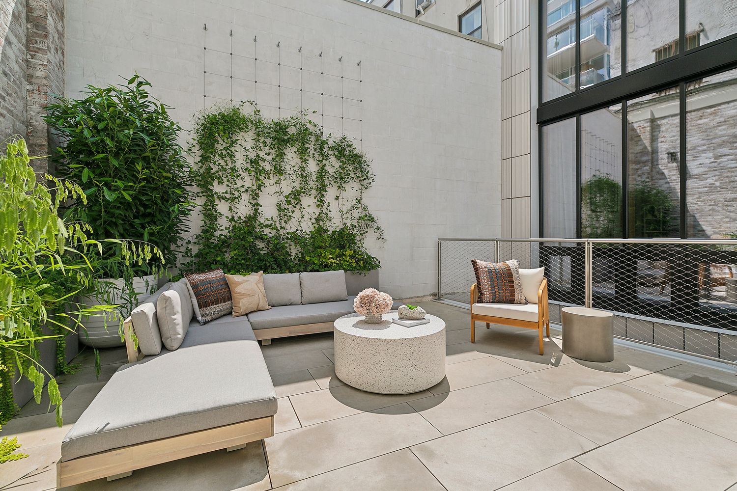 a outdoor living space with furniture and garden view