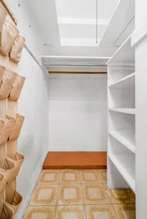 a bathroom with a sink toilet and mirror
