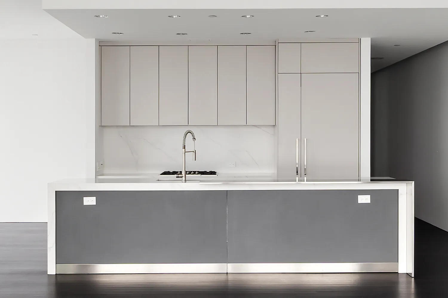 a close view of sink and cabinets