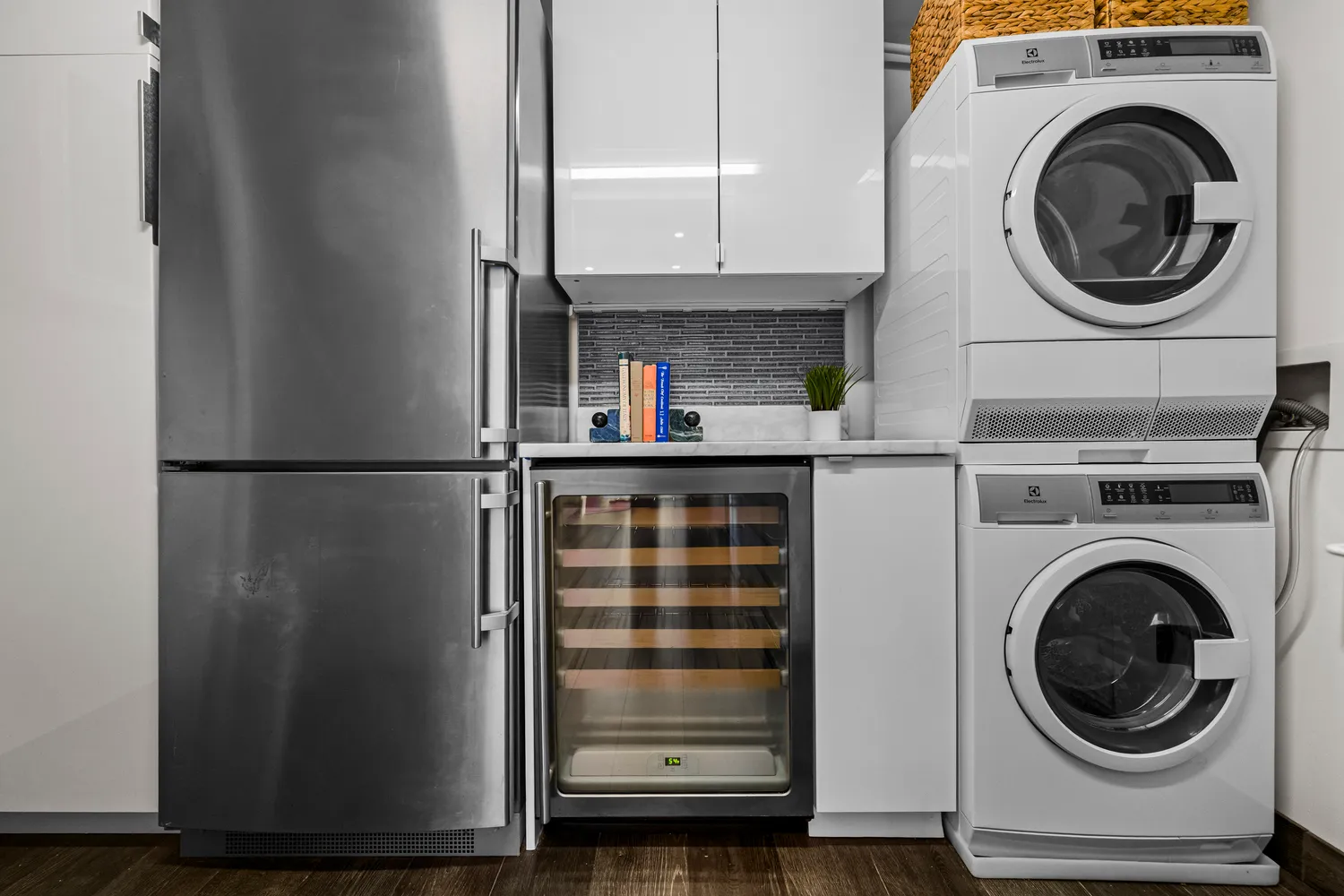 a view of a kitchen with washer and dryer