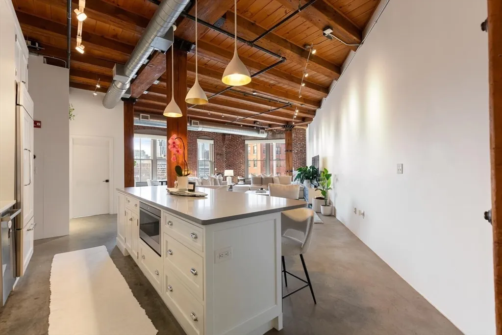 a kitchen with a sink and stove