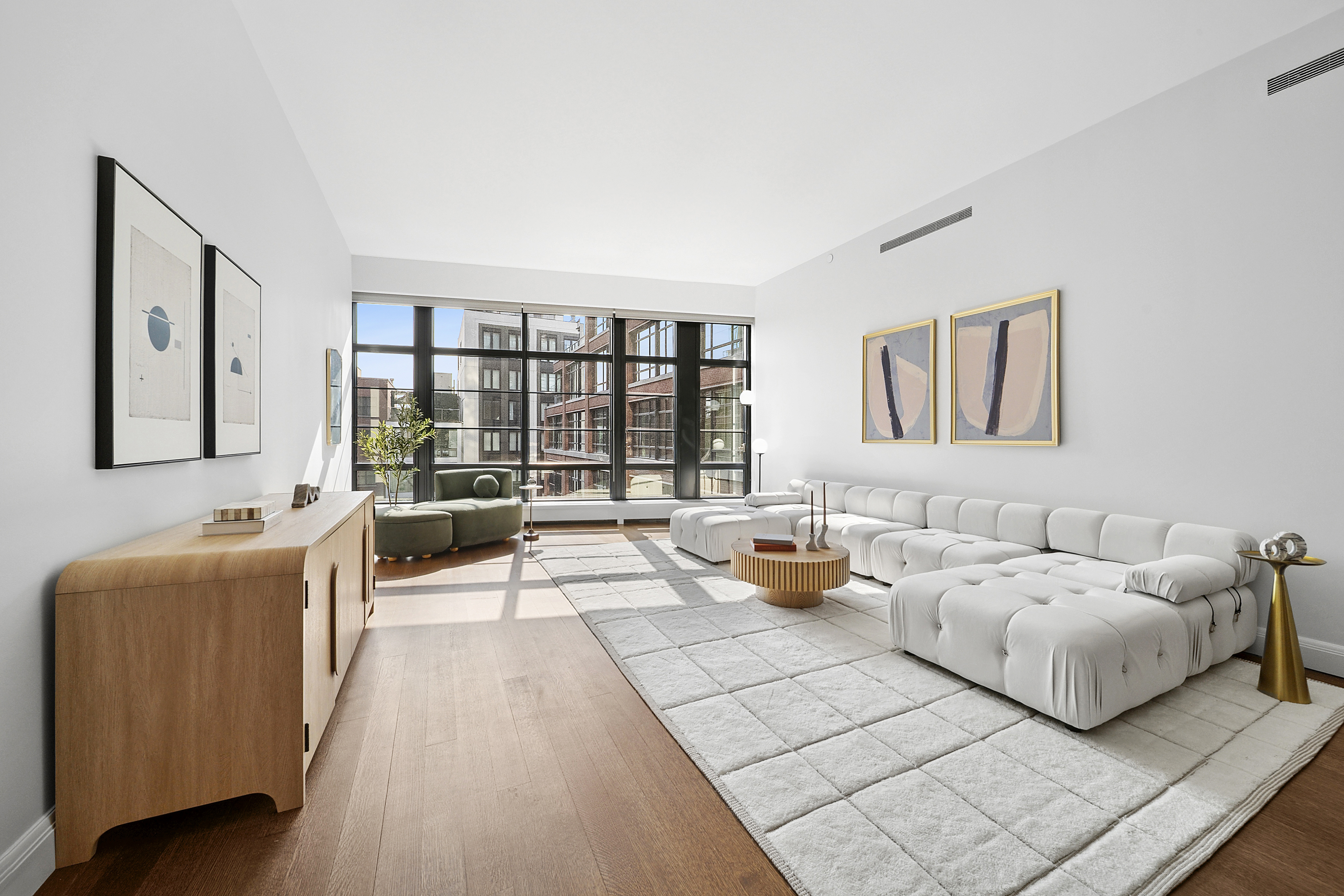 150 Charles Street, Unit 4AN Manhattan, NY 10014 - Photo 1 of 19 a bedroom with furniture and large windows