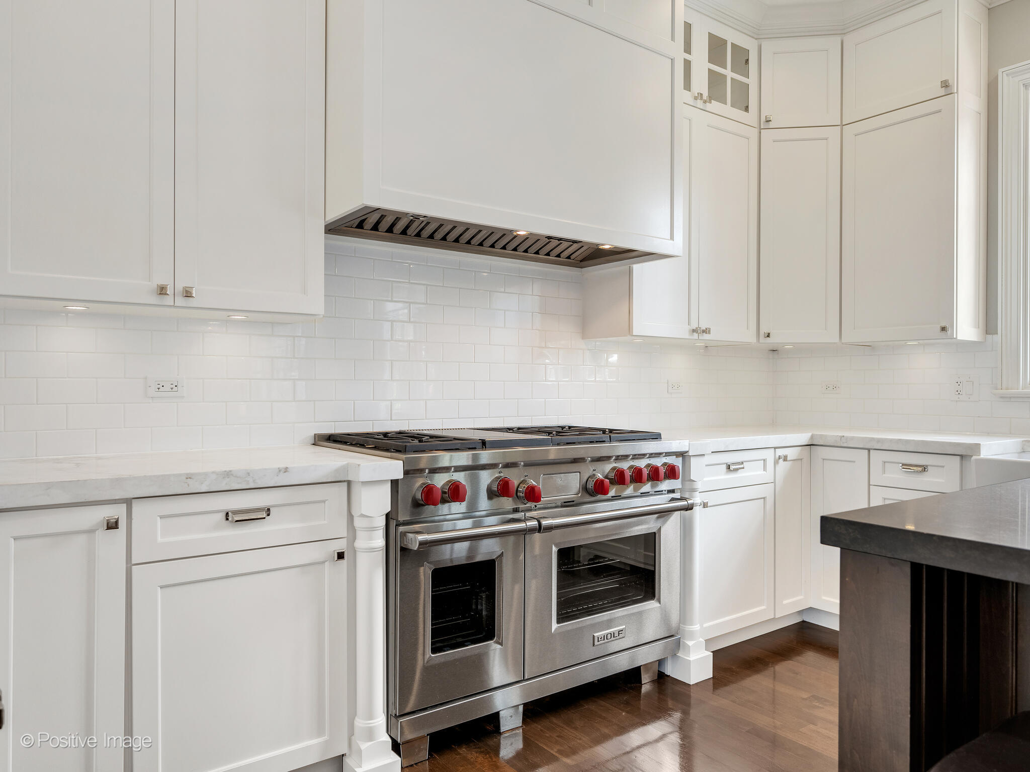 17 South Bruner Street Hinsdale, IL 60521 - Photo 15 of 42 a kitchen with white cabinets and white appliances