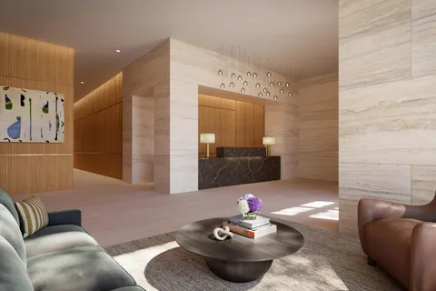 a living room with furniture and a mirror