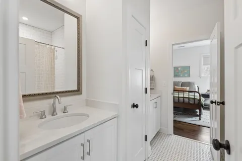 a bathroom with a bathtub and a toilet