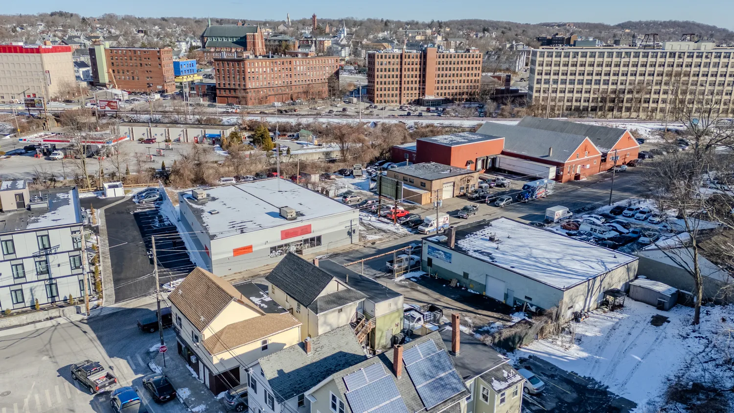 an aerial view of a city with streets and buildings