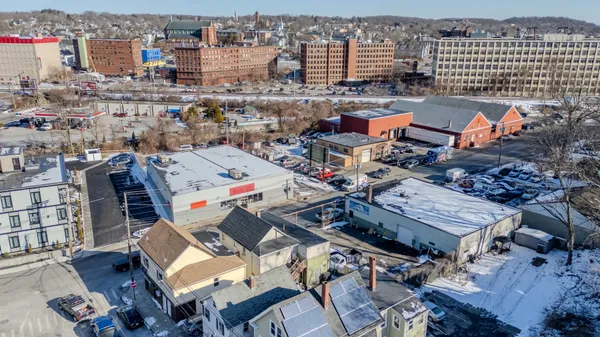 an aerial view of a city with streets and buildings