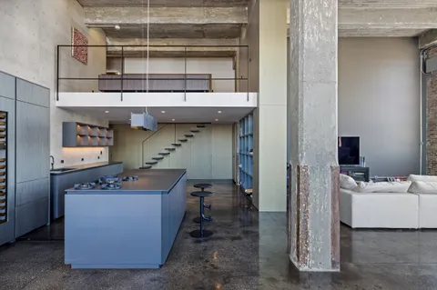a room with cabinets and a wooden floor