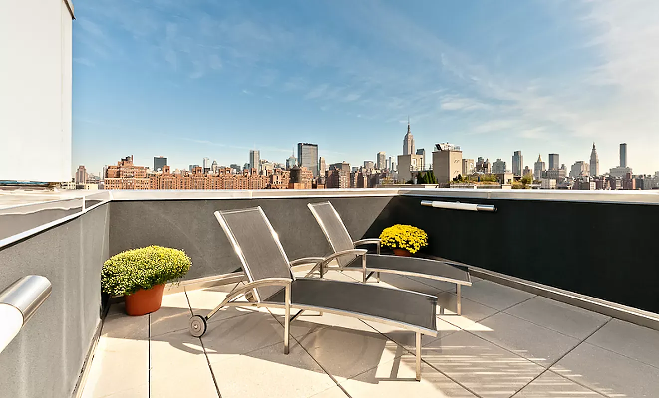447 West 18th Street, Unit 7A Manhattan, NY 10011 - Photo 15 of 16 a view of a chairs and table on the terrace