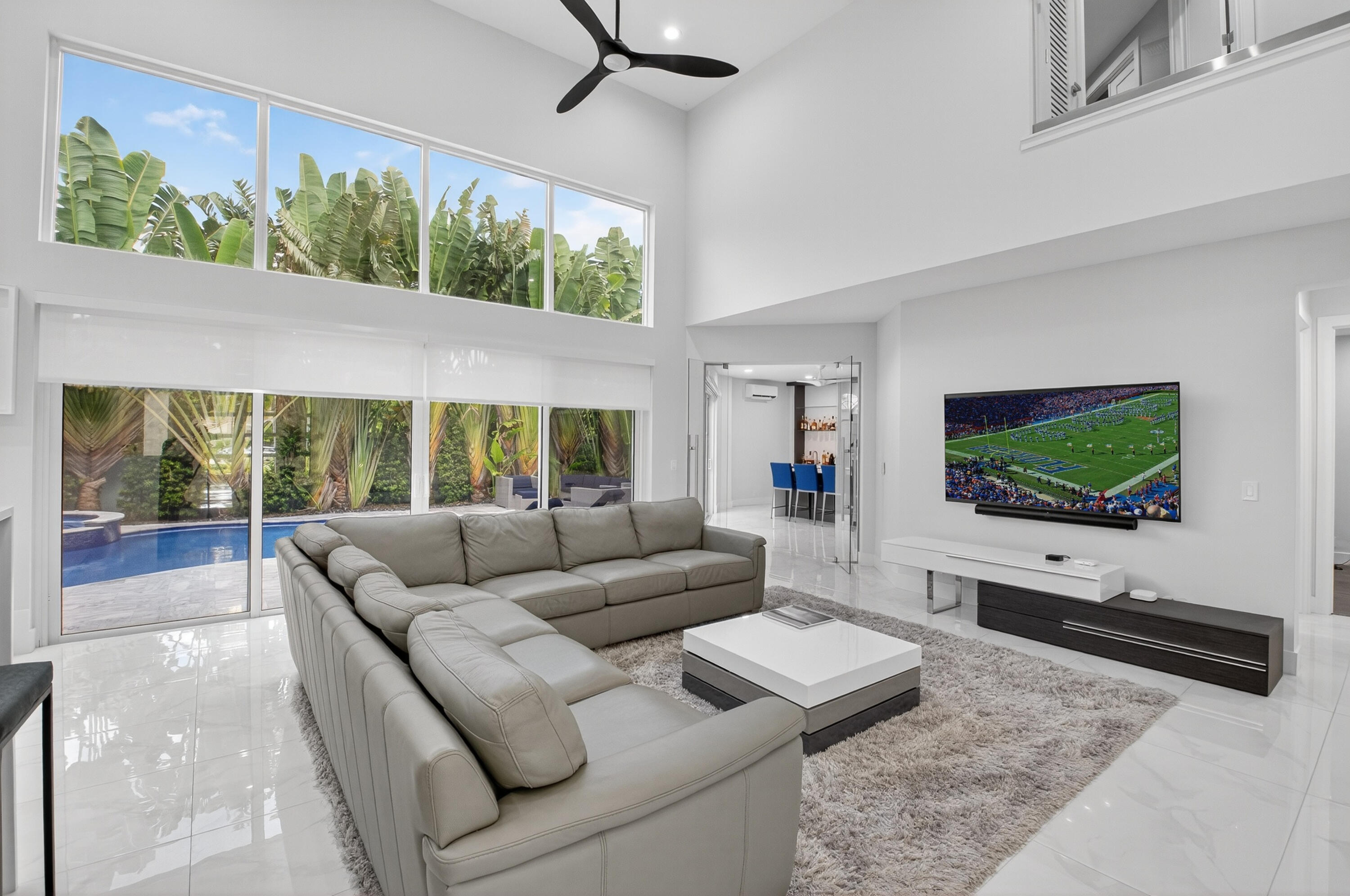6529 Somerset Circle Boca Raton, FL 33496 - Photo 14 of 75 a living room with furniture and a flat screen tv