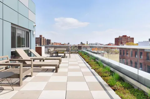 a view of balcony with seating space