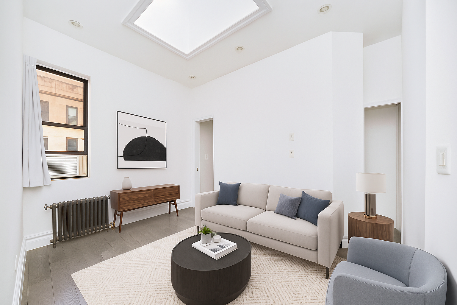 20 Avenue A, Unit 5E Manhattan, NY 10009 - Photo 2 of 8 a living room with furniture and a couch