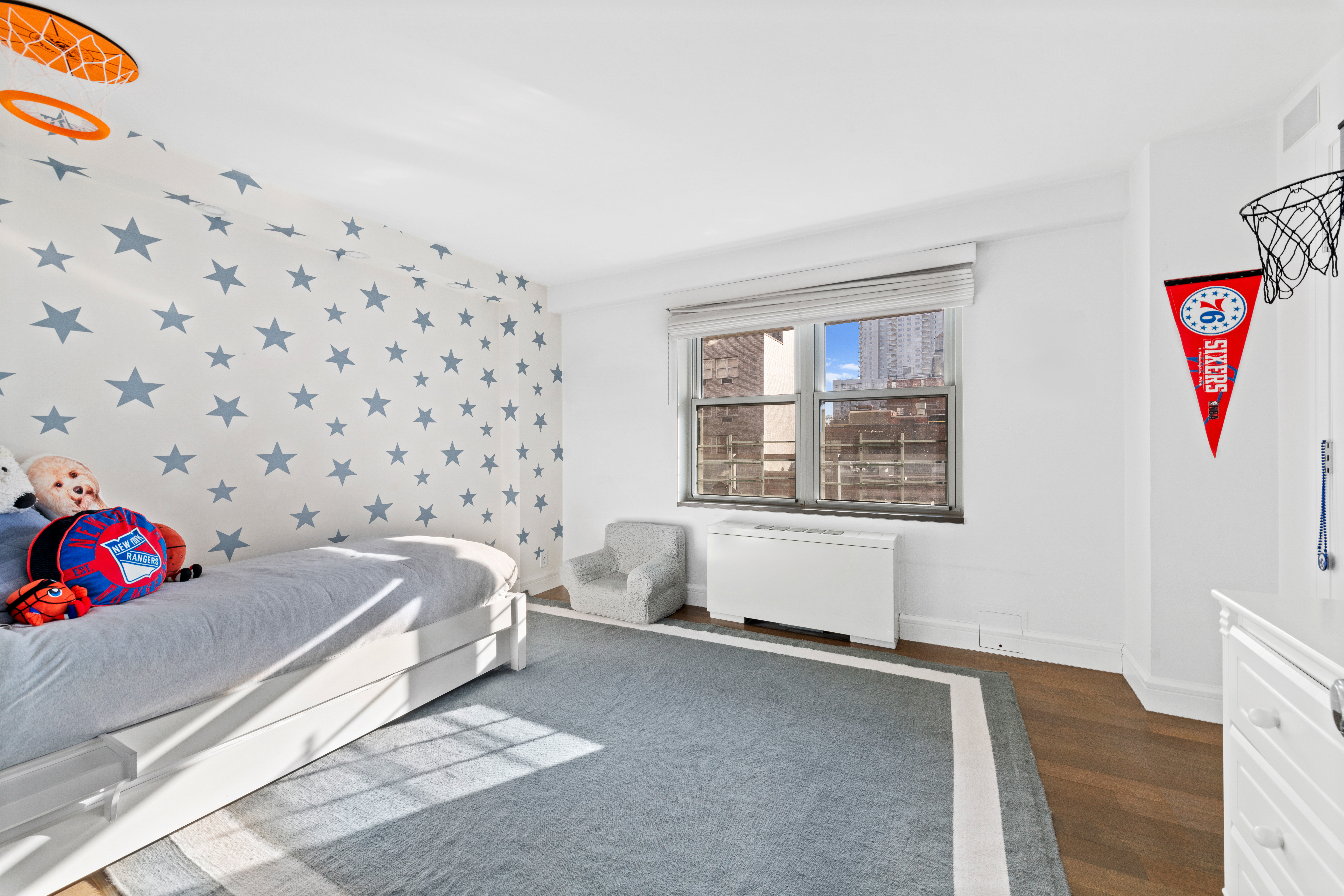 363 East 76th Street, Unit 7C Manhattan, NY 10021 - Photo 8 of 19 a bedroom with a bed and a window