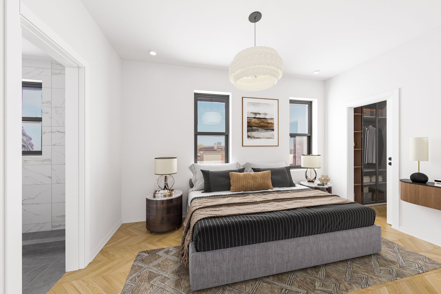 a bedroom with a large bed and a chandelier