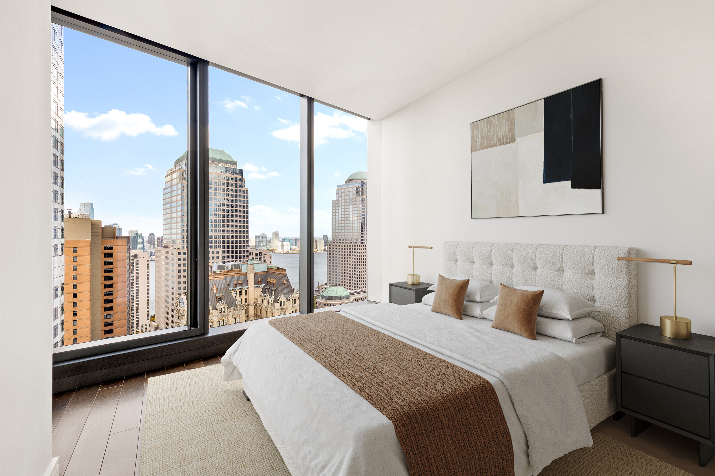 125 Greenwich Street, Unit 37C Manhattan, NY 10006 - Photo 12 of 24 a bedroom with a large window and a bed