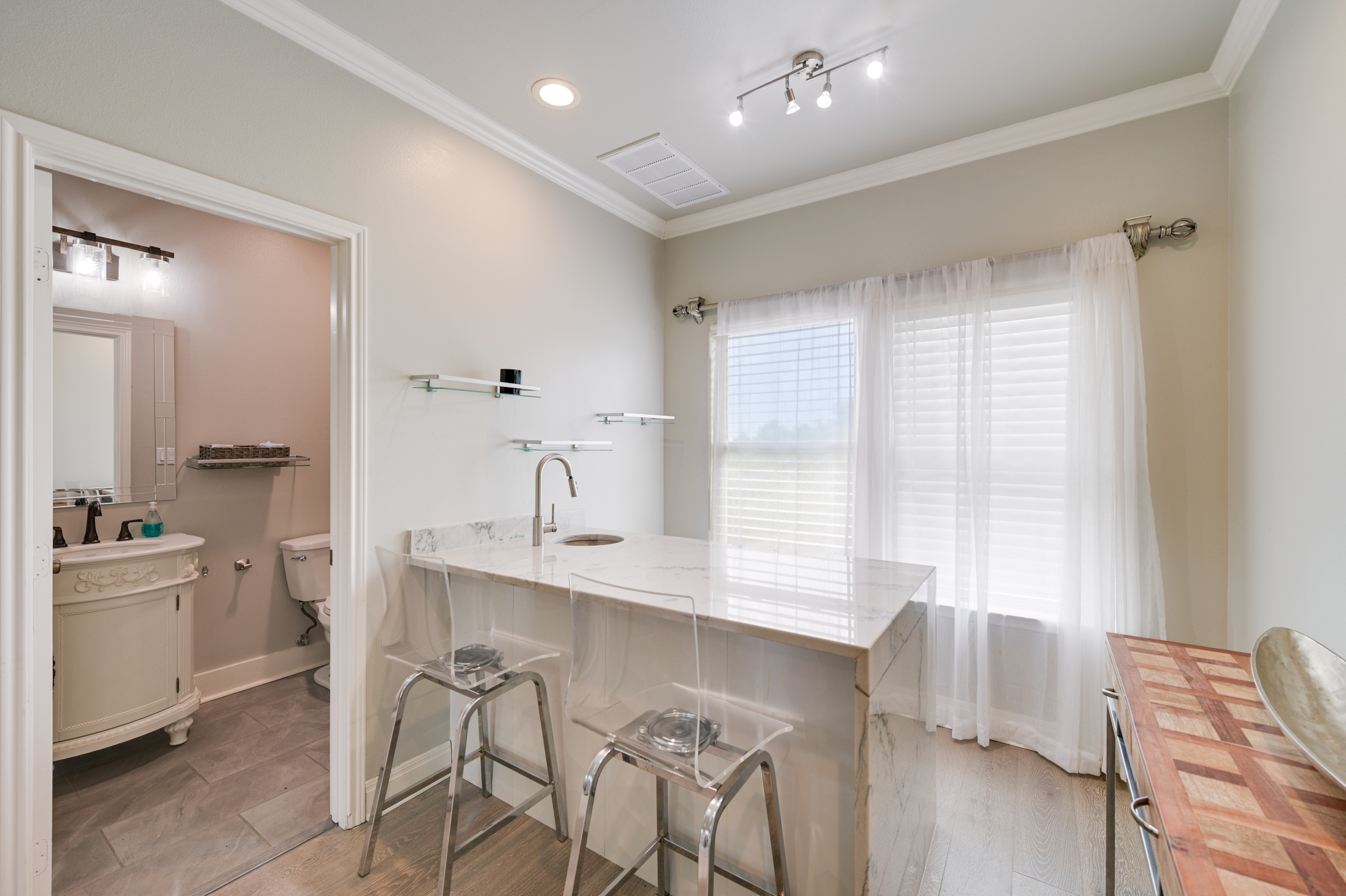 14913 Murfin Road Austin, TX 78734 - Photo 37 of 40 a kitchen with furniture and window