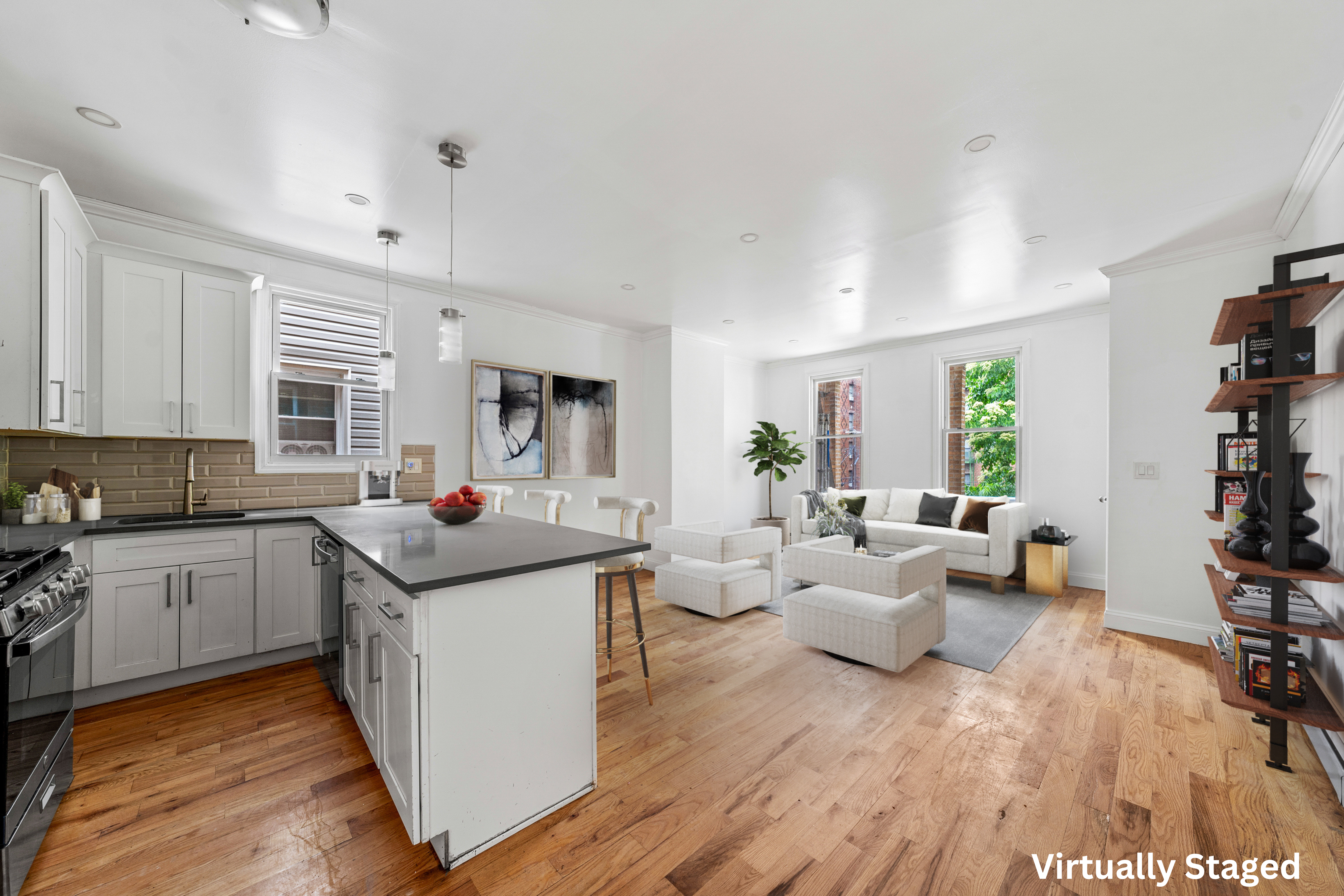 662 Burke Avenue Bronx, NY 10467 - Photo 1 of 18 a living room with furniture and wooden floor