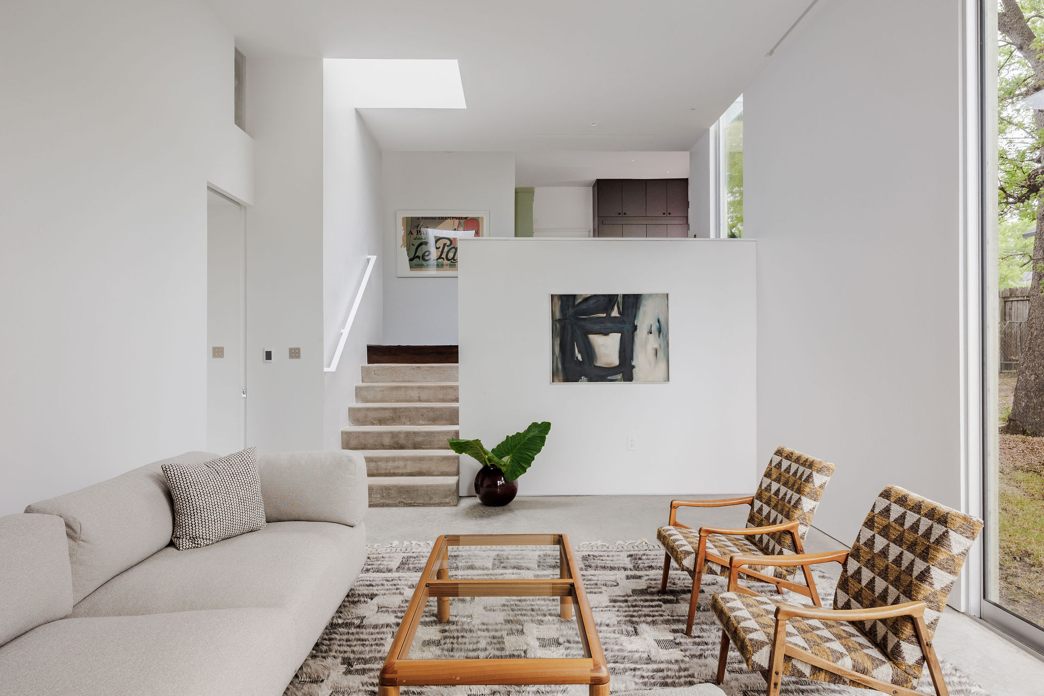 606 West 35th Street Austin, TX 78705 - Photo 21 of 37 a living room with furniture and wooden floor
