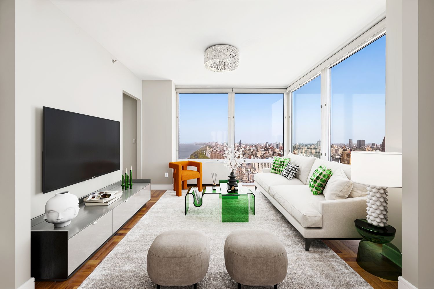 a living room with furniture and a flat screen tv