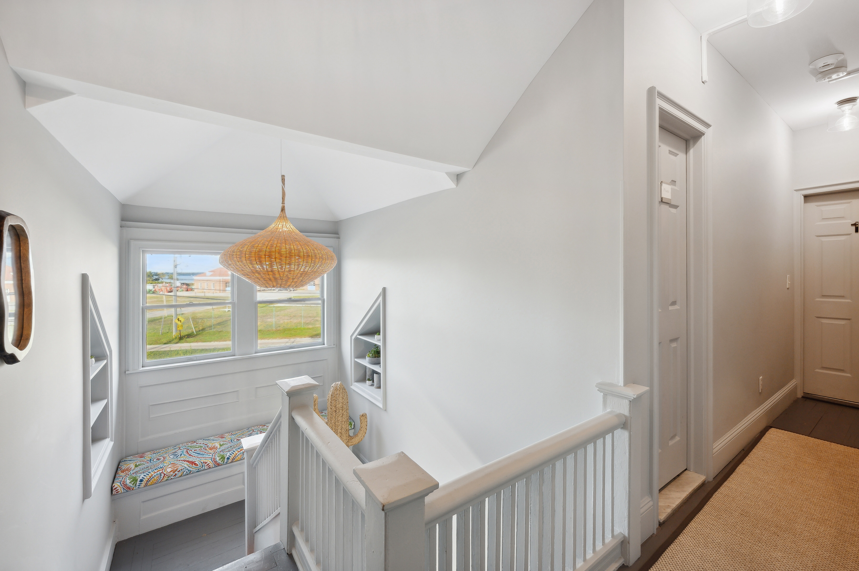 32 Lighthouse Road Hampton Bays, NY 11946 - Photo 22 of 51 a view of livingroom with furniture and window