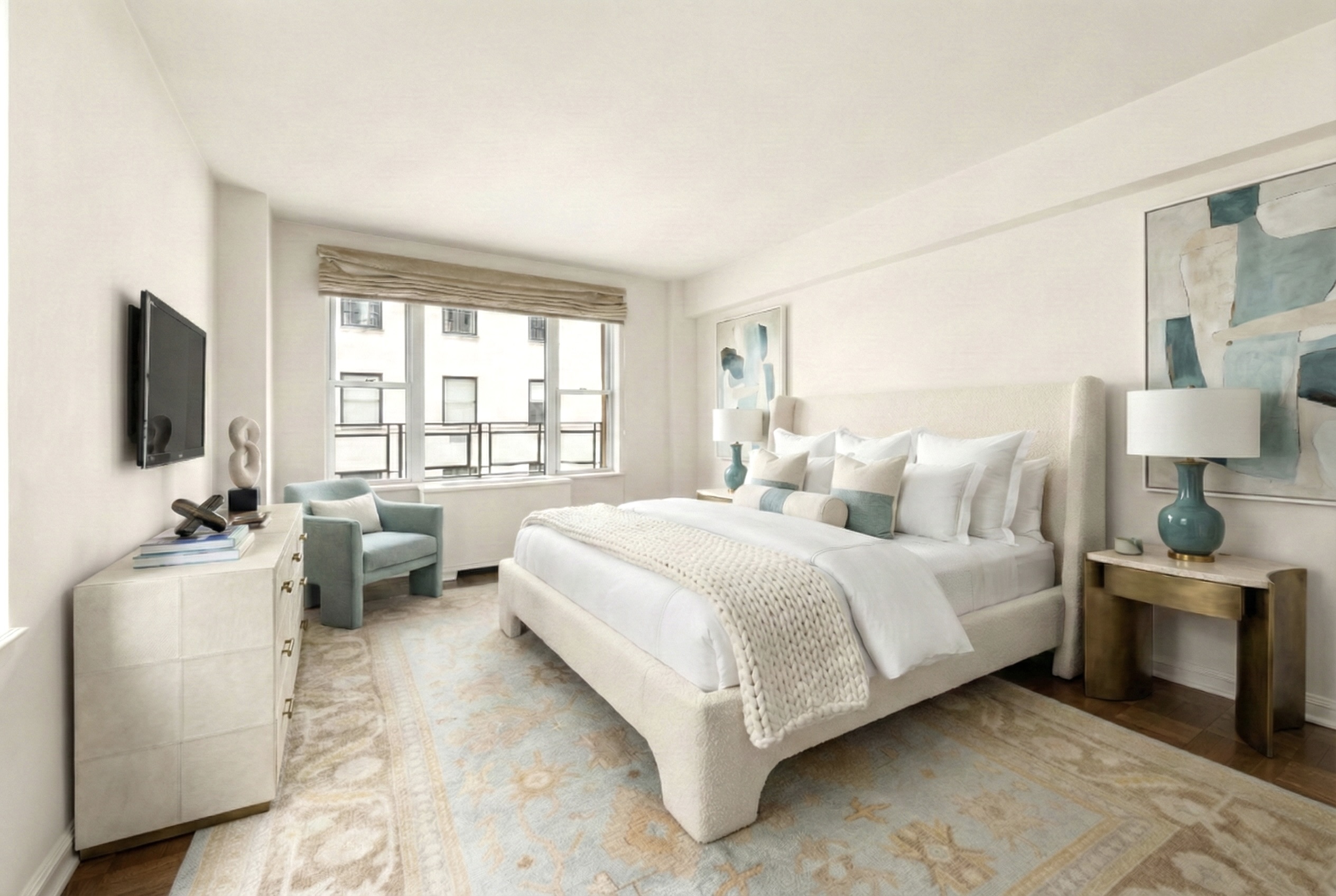 1 East 66th Street, Unit 9EF Manhattan, NY 10065 - Photo 10 of 19 a bedroom with a bed and a flat screen tv