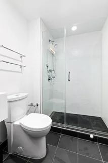 a front view of a building with parking space