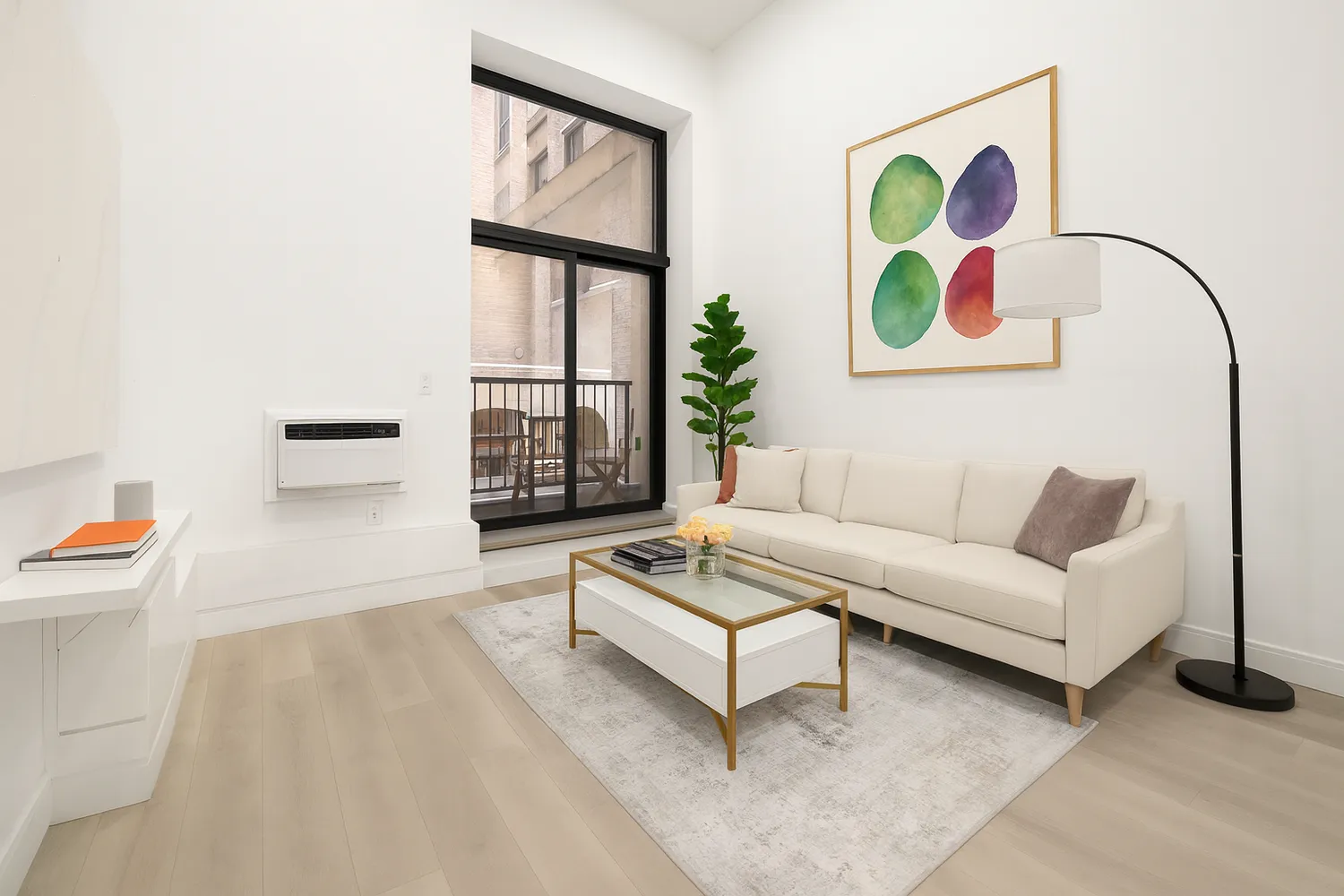 a living room with furniture and a window