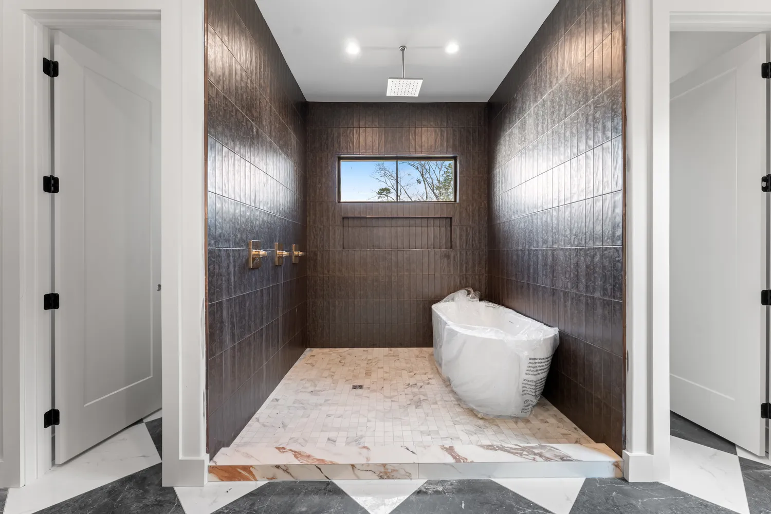 a bathroom with a sink and vanity