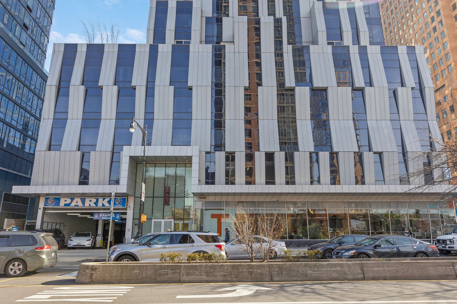 150 Myrtle Avenue, Unit 803 Brooklyn, NY 11201 - Photo 24 of 29 a front view of a building with glass windows