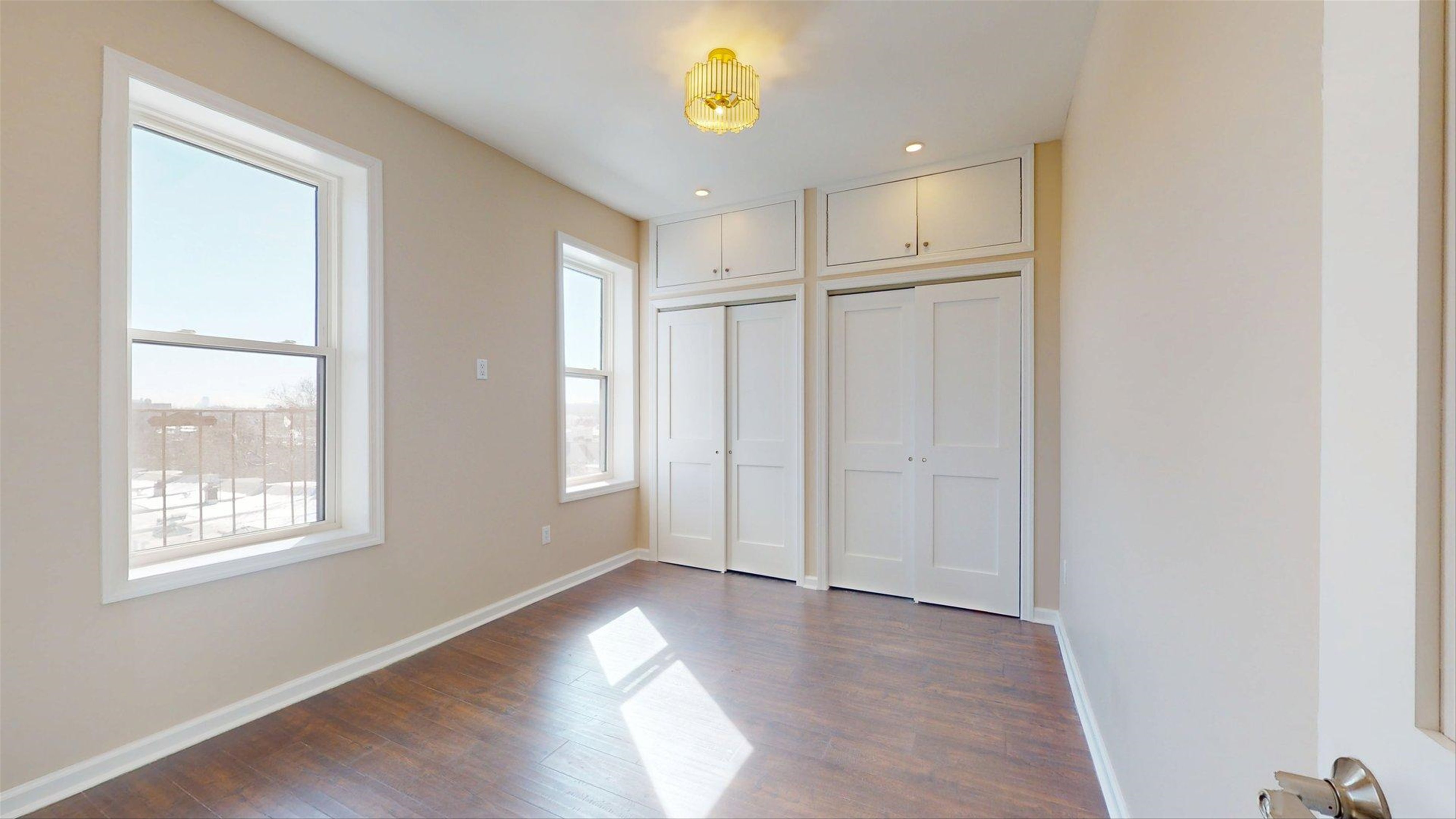 7609 4th Avenue, Unit E14 Brooklyn, NY 11209 - Photo 10 of 15 a view of an empty room with a window