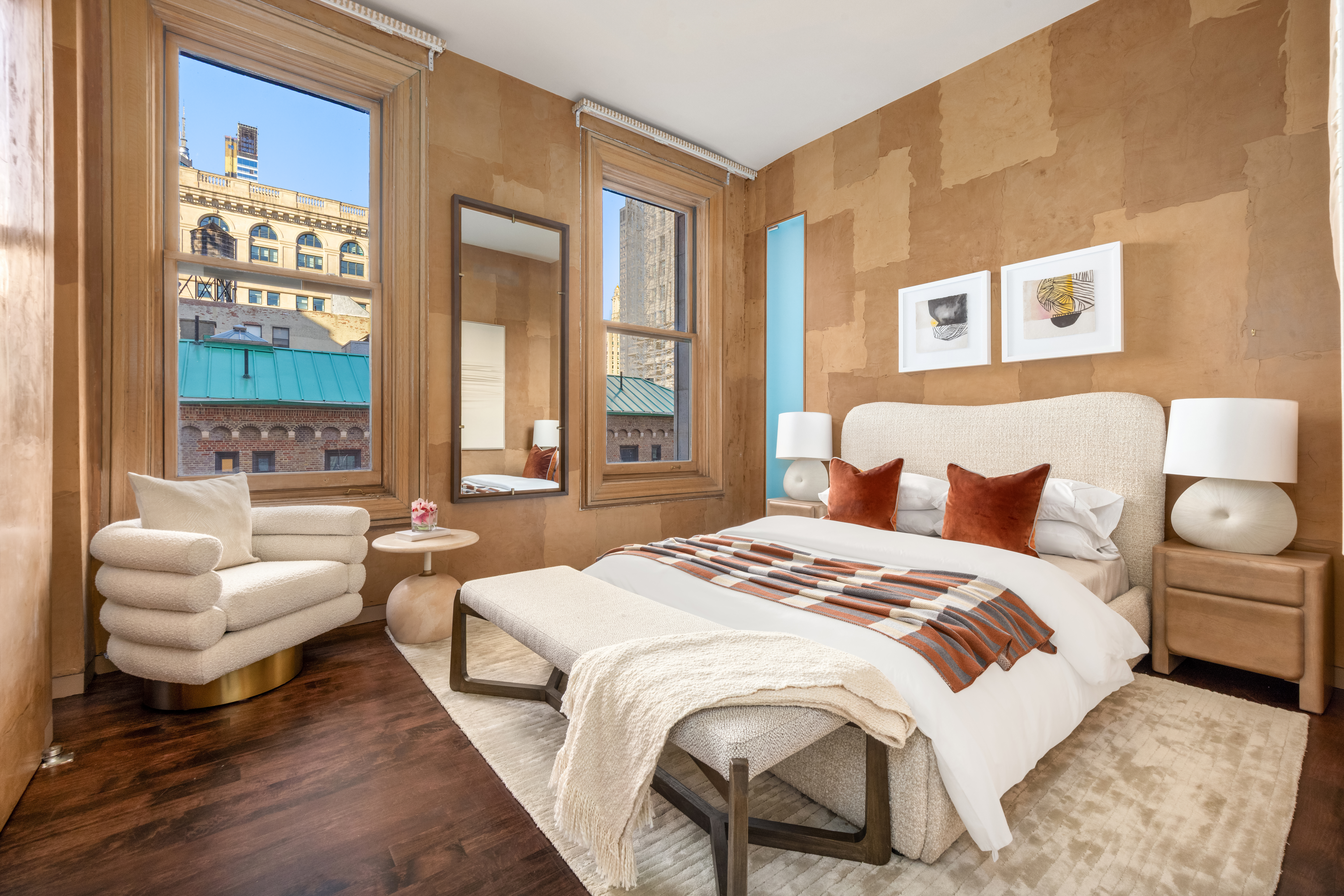 170 5th Avenue, Unit 5 Manhattan, NY 10010 - Photo 18 of 22 a spacious bedroom with a bed and glass windows
