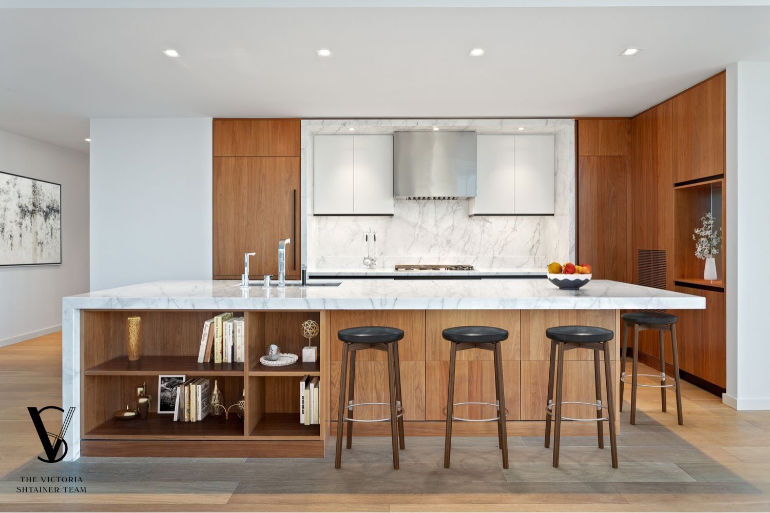 1 West End Avenue, Unit C28 Manhattan, NY 10069 - Photo 4 of 26 a kitchen with stainless steel appliances granite countertop a stove a sink and a refrigerator