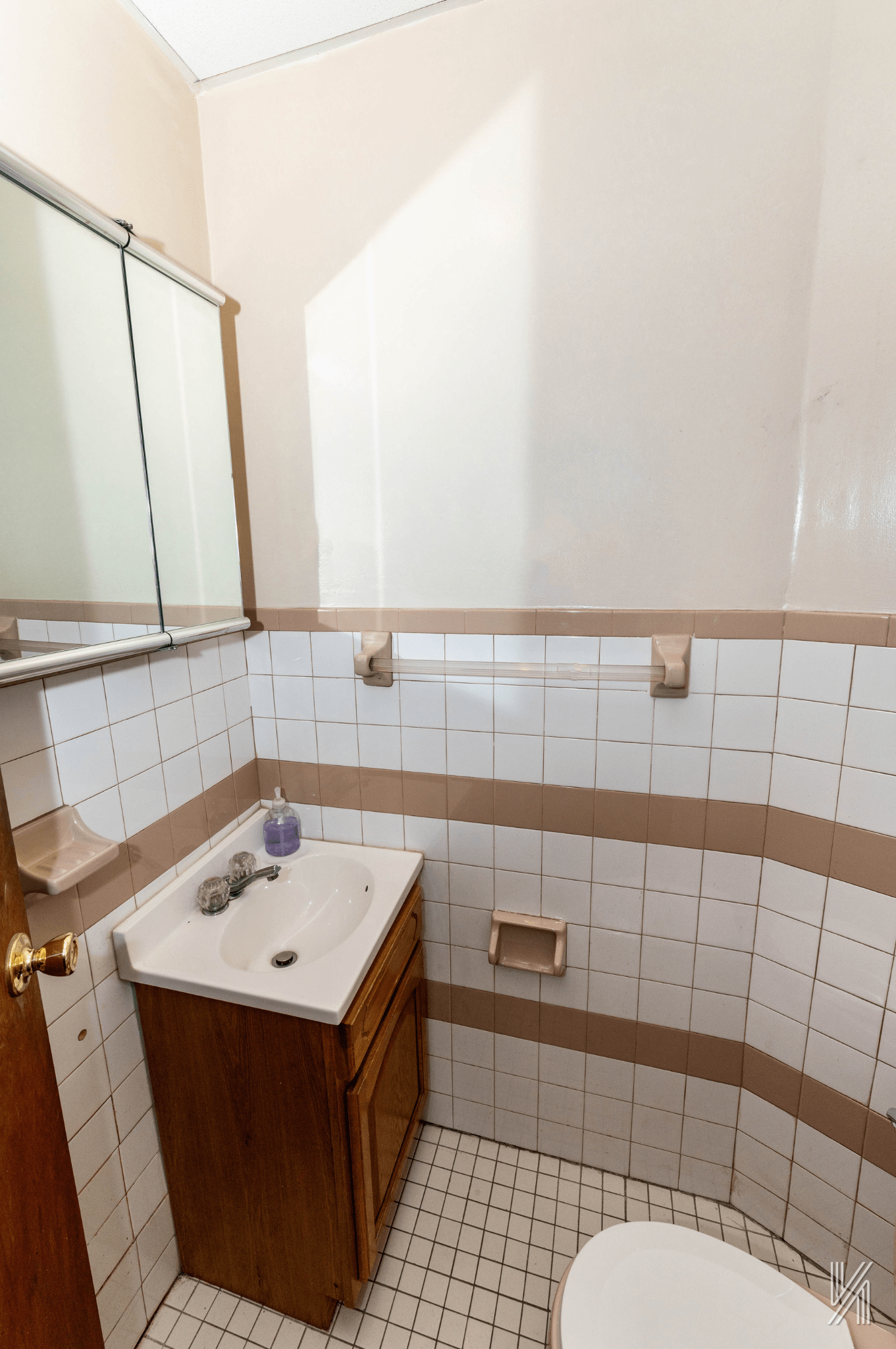 32-10 35th Street Queens, NY 11106 - Photo 7 of 29 a bathroom with a sink a toilet and shower