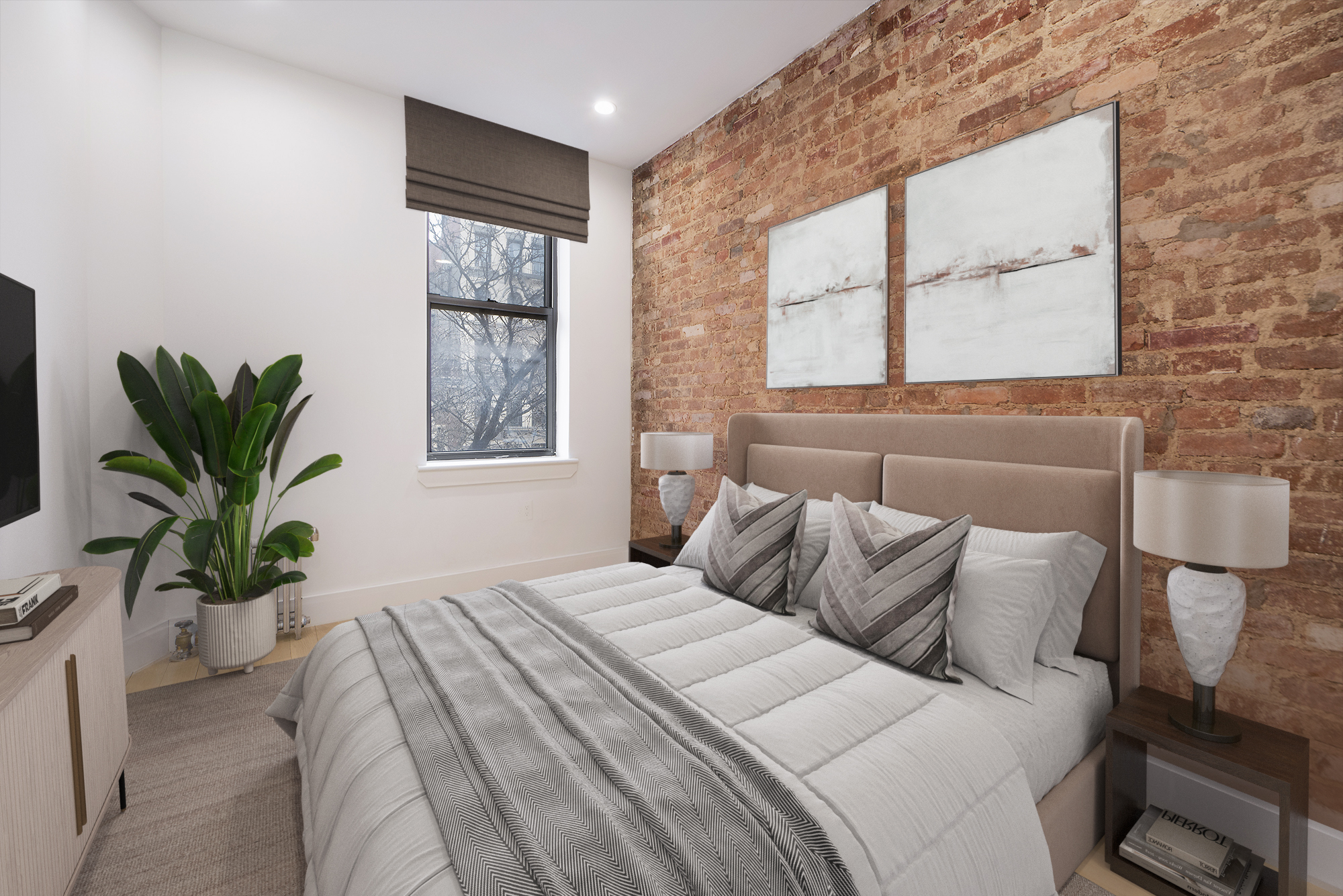 129 2nd Avenue, Unit 8 Manhattan, NY 10003 - Photo 5 of 11 a bedroom with a large bed and a window