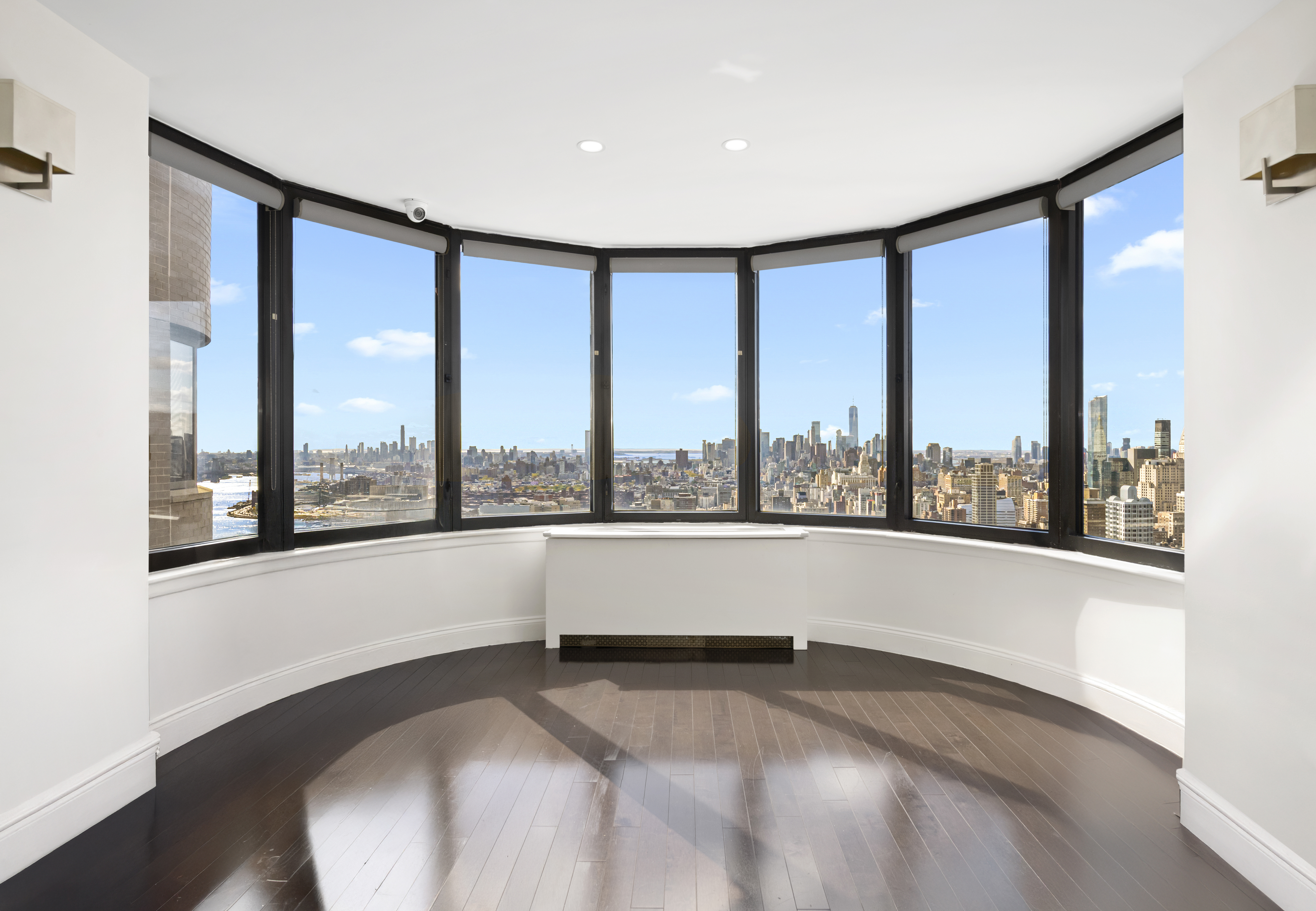 330 East 38th Street, Unit PHB Manhattan, NY 10016 - Photo 4 of 11 a large white room with a large window