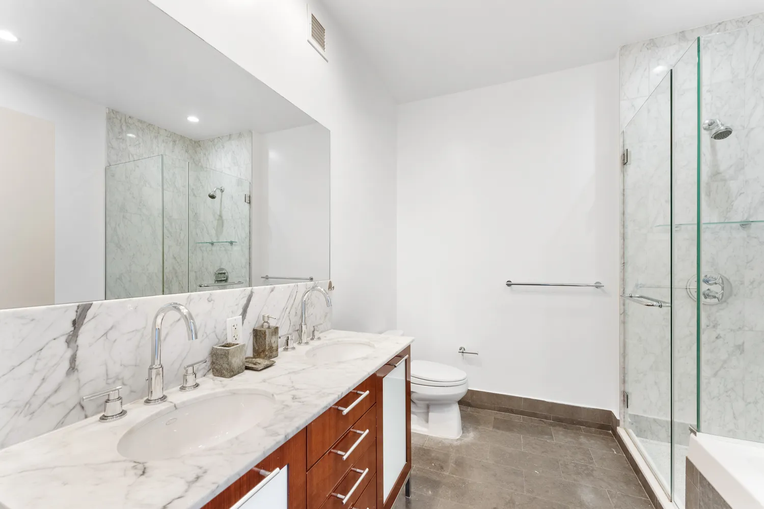 a bathroom with a bathtub and a sink
