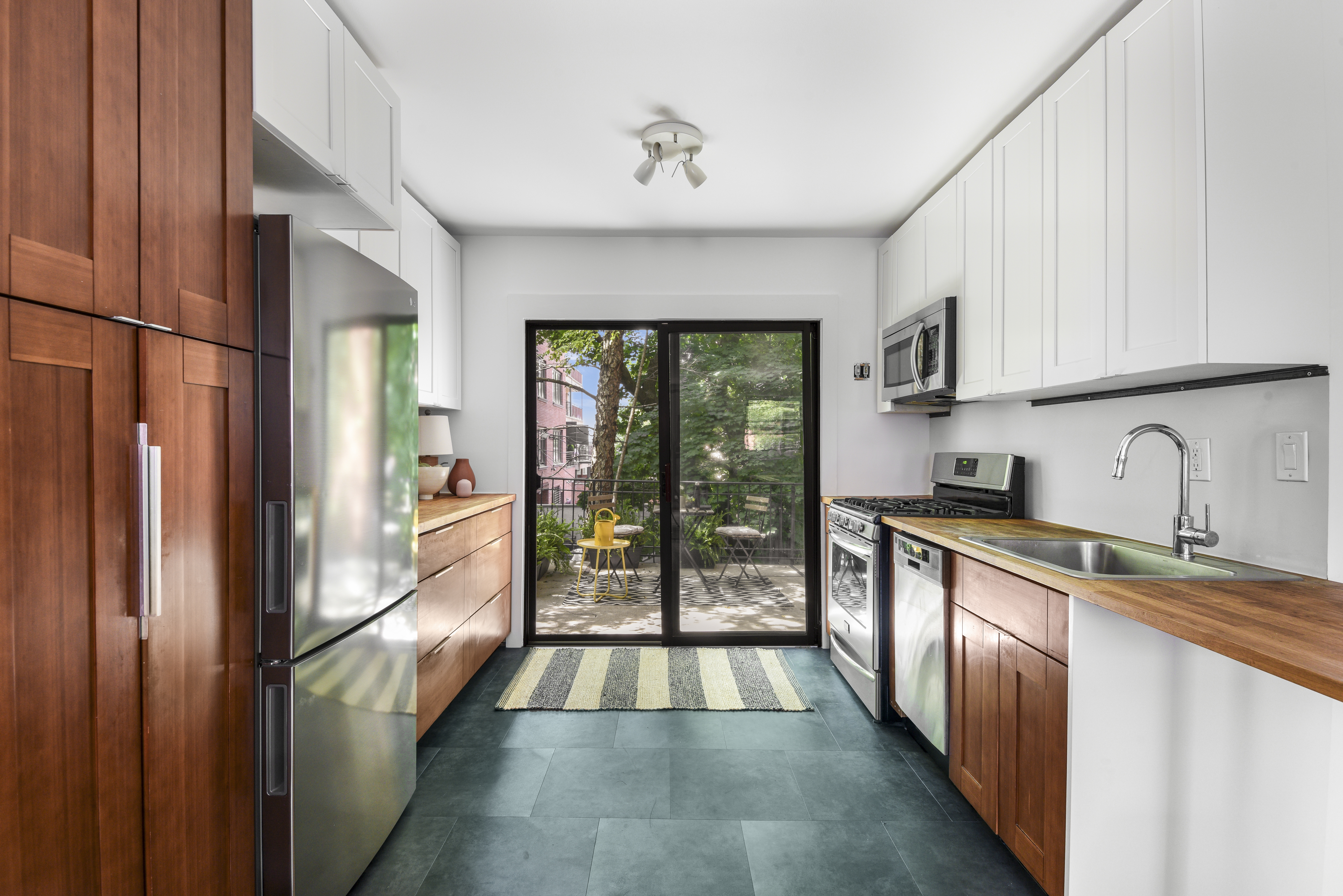 444 Union Street Brooklyn, NY 11231 - Photo 6 of 13 a kitchen with stainless steel appliances granite countertop a refrigerator and a sink