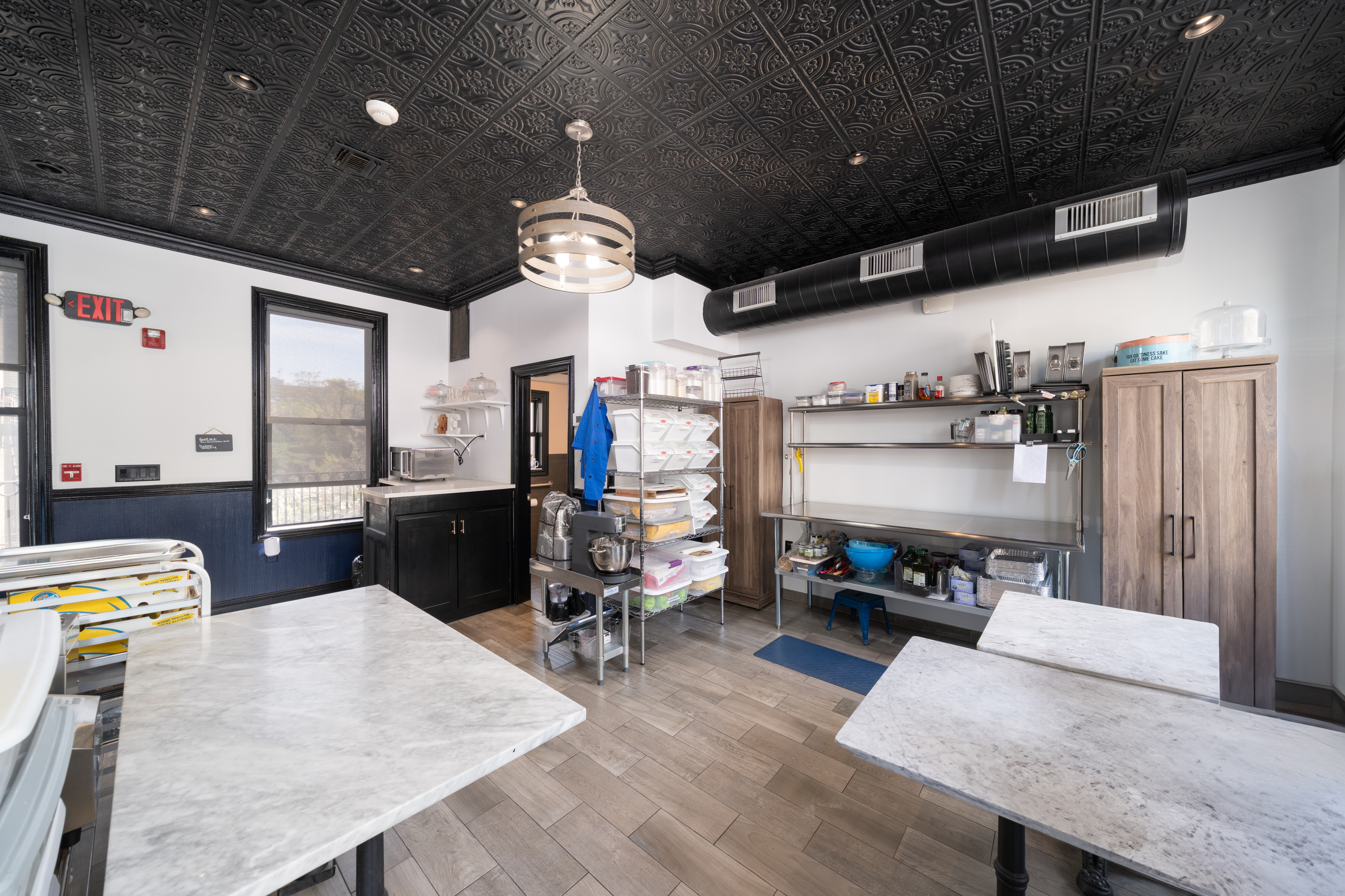 155 3rd Street Hoboken, NJ 07030 - Photo 10 of 18 a living room with lots of furniture and kitchen view