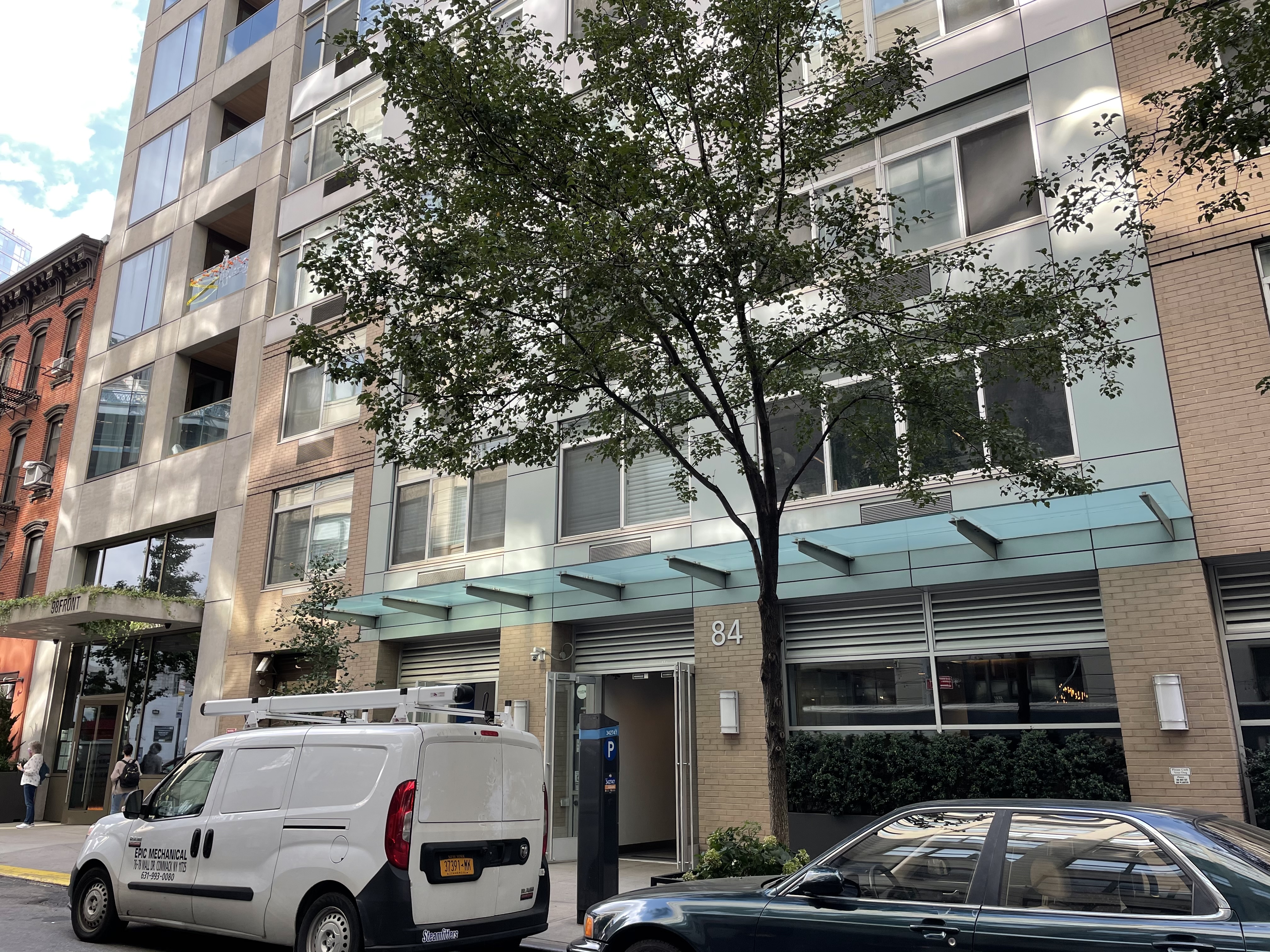 84 Front Street, Unit 7F Brooklyn, NY 11201 - Photo 8 of 12 a view of a cars park in front of a building