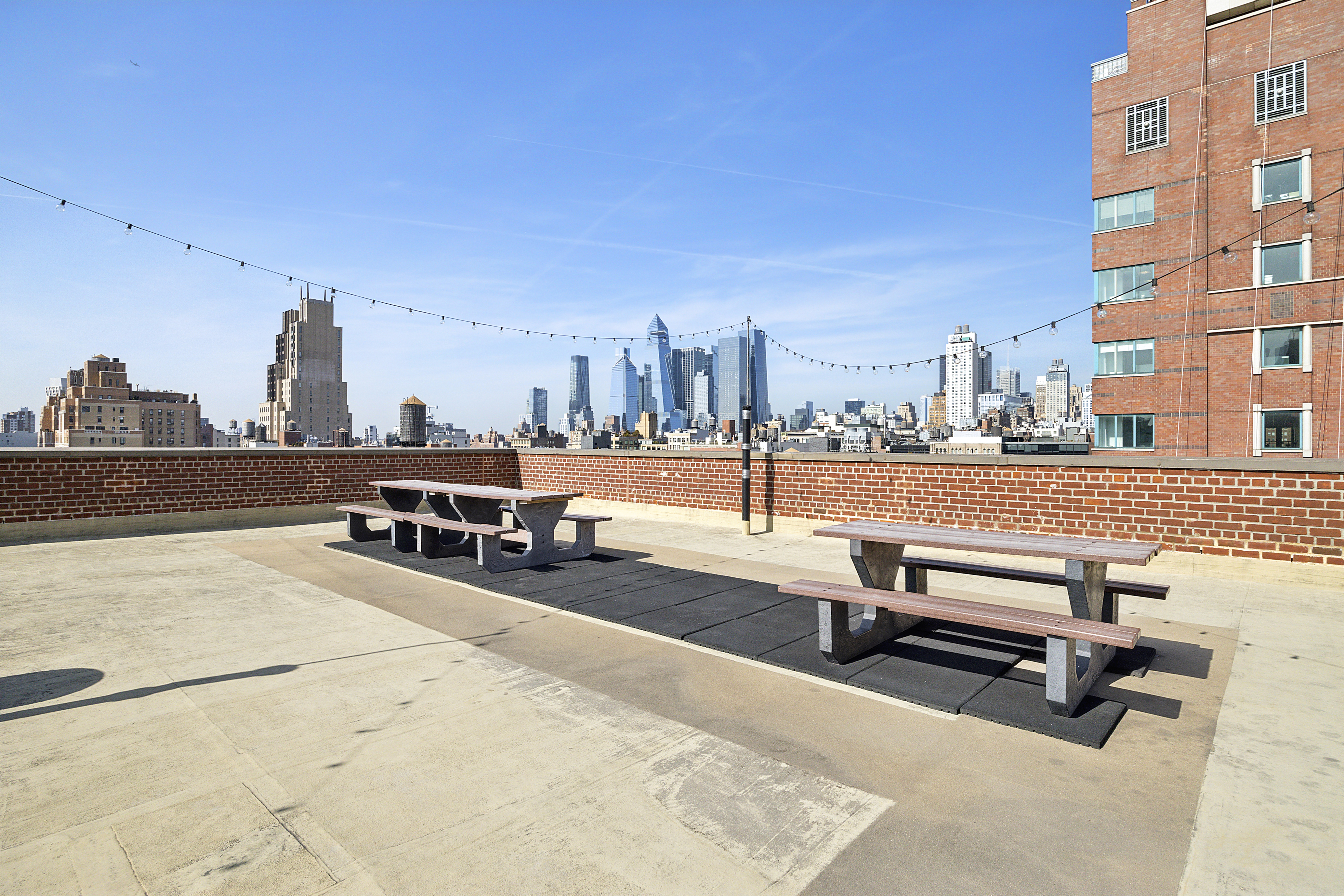 54 West 16th Street, Unit 6F Manhattan, NY 10011 - Photo 7 of 8 a view of a terrace with chairs