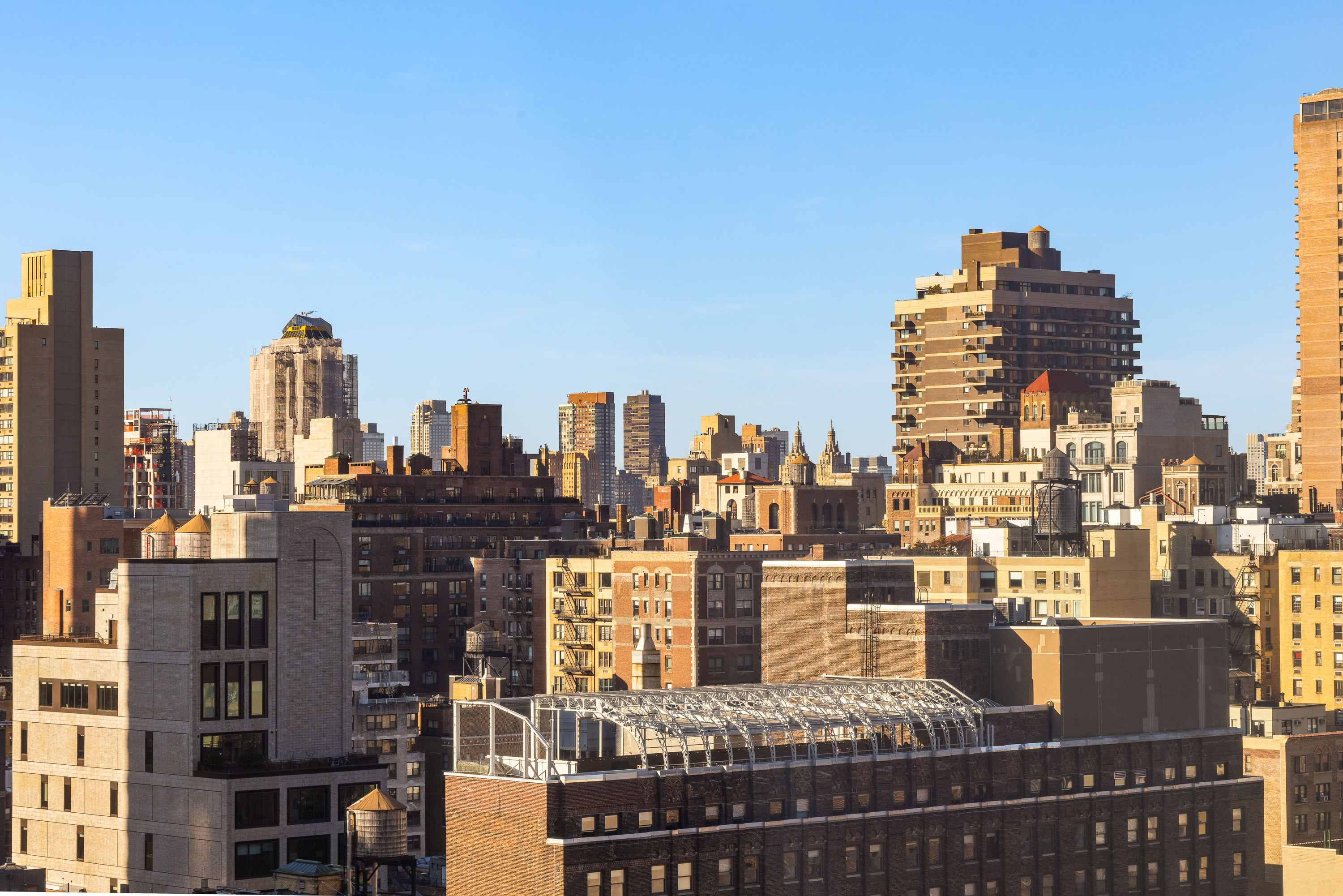 200 East 94th Street, Unit 2309 Manhattan, NY 10128 - Photo 9 of 17 a city view with tall buildings