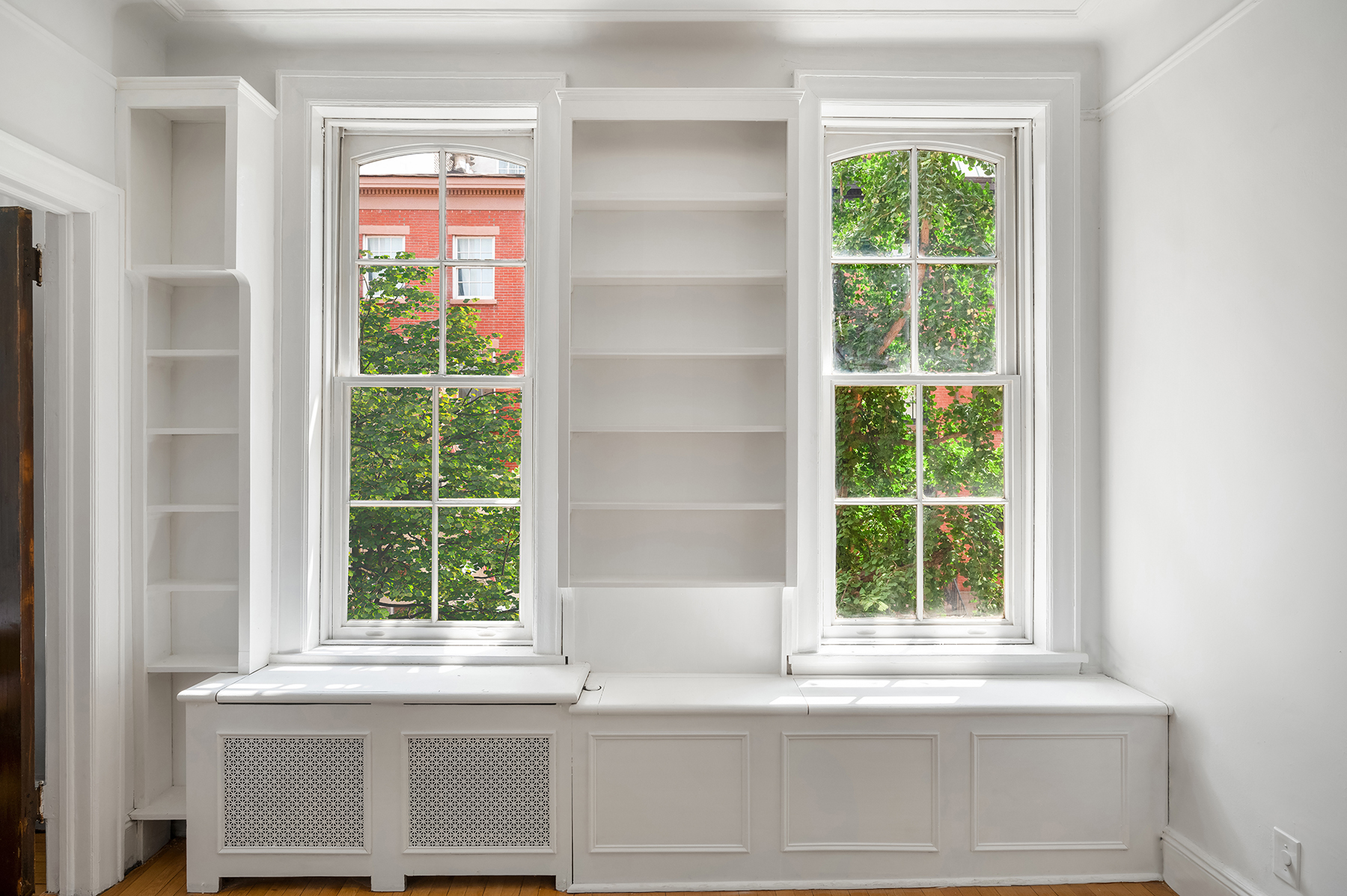 29 Perry Street, Unit 2F Manhattan, NY 10014 - Photo 3 of 17 a view of a window and a kitchen