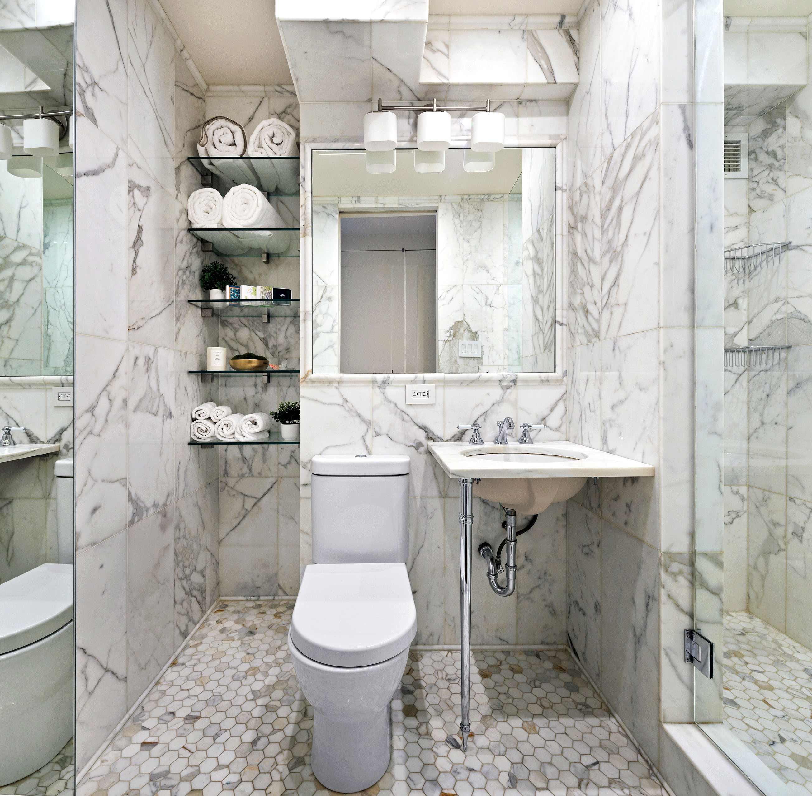 715 Park Avenue, Unit 11A Manhattan, NY 10021 - Photo 10 of 12 a bathroom with a sink toilet and shower