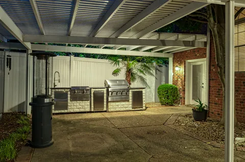 a view of a porch of a house