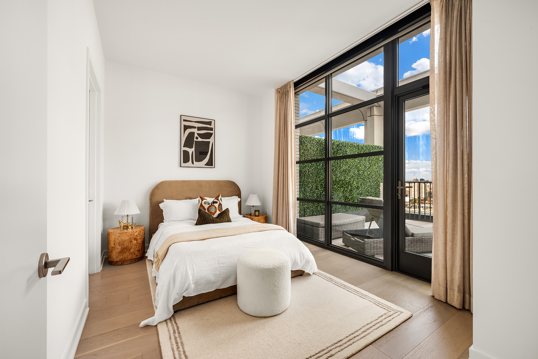 115 York Street, Unit PH20B Brooklyn, NY 11201 - Photo 9 of 21 a bedroom with a bed and wooden floor