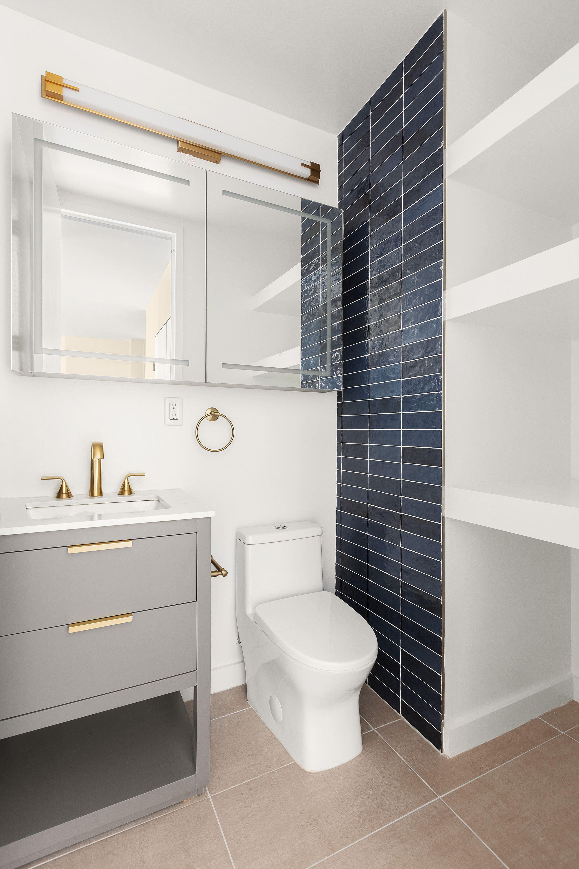 161 West 61st Street, Unit 5C Manhattan, NY 10023 - Photo 10 of 30 a bathroom with a toilet and a sink