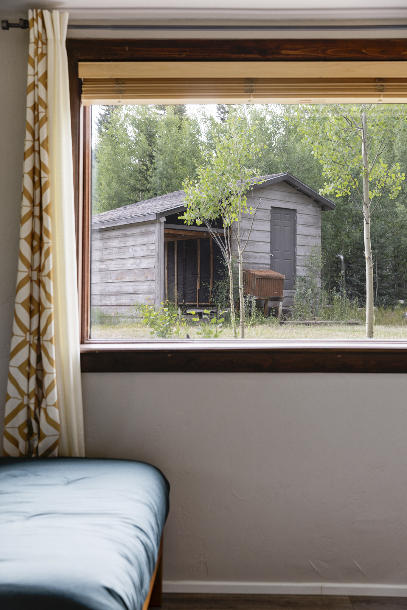 133 Gold Run Road Alma, CO 80420 - Photo 22 of 46 a bedroom with a bed and a large window