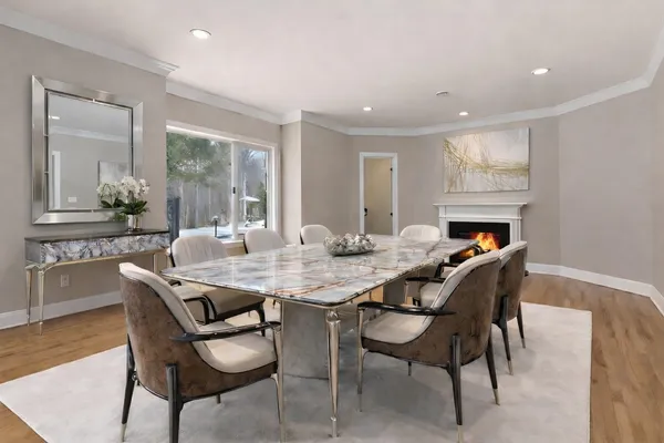 a dining room with furniture and window